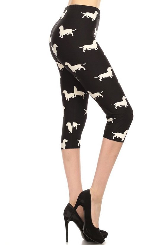 Dog Print, High Waisted Capri Leggings In A Fitted Style With An Elastic Waistband.